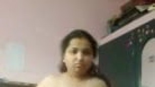 Chubby Indian wife strips