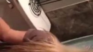 Amateur d. blonde gives a blowjob in the bathroom