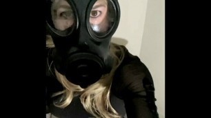 Alexandra Braces is wearing a gas mask and rides a dildo until she cums